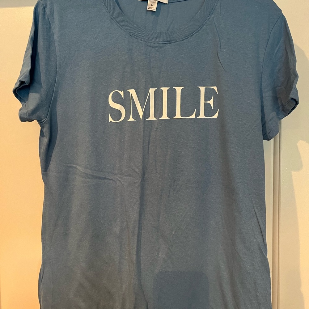 EUC. Sub-urban riot SMILE tshirt in light blue. Size L